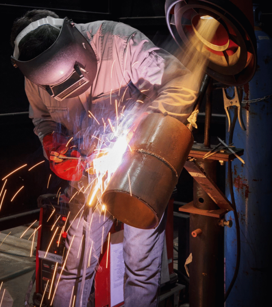 Welder performing SMAW welding at PTSPL