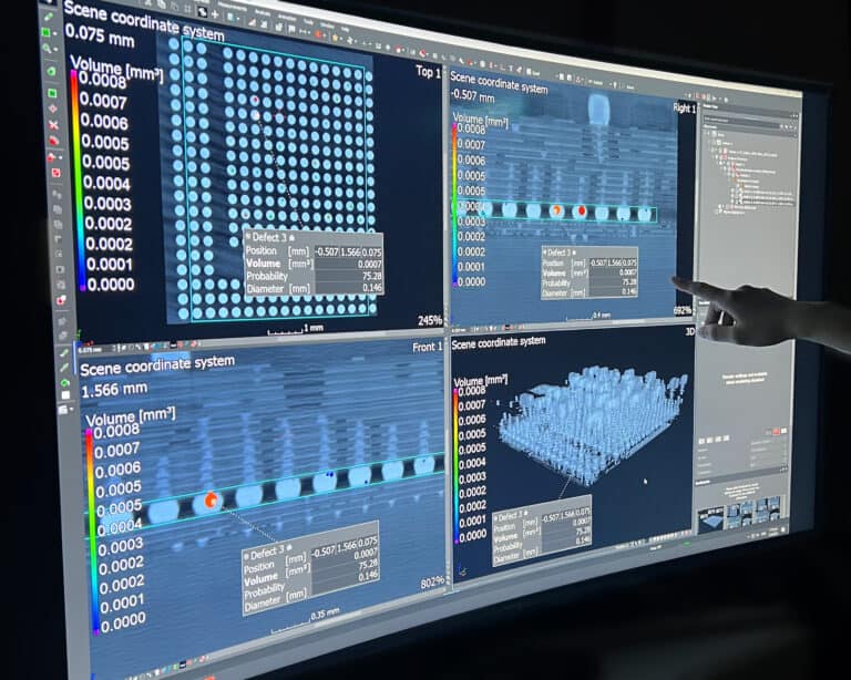 CT scan analysis software showing defect detection and volumetric data during an industrial CT scan.